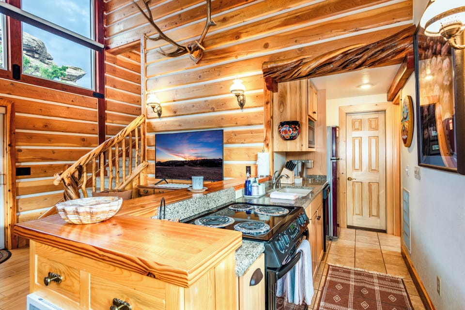 Fully stocked kitchen, with full-sized appliances.
