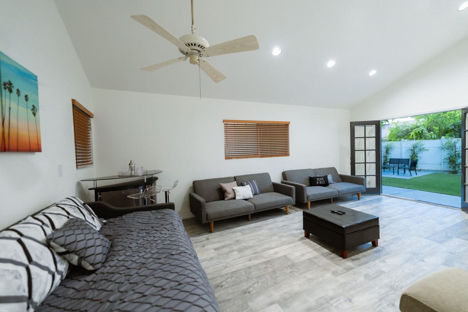 Main entertainment room with daybed and 2 sofa beds