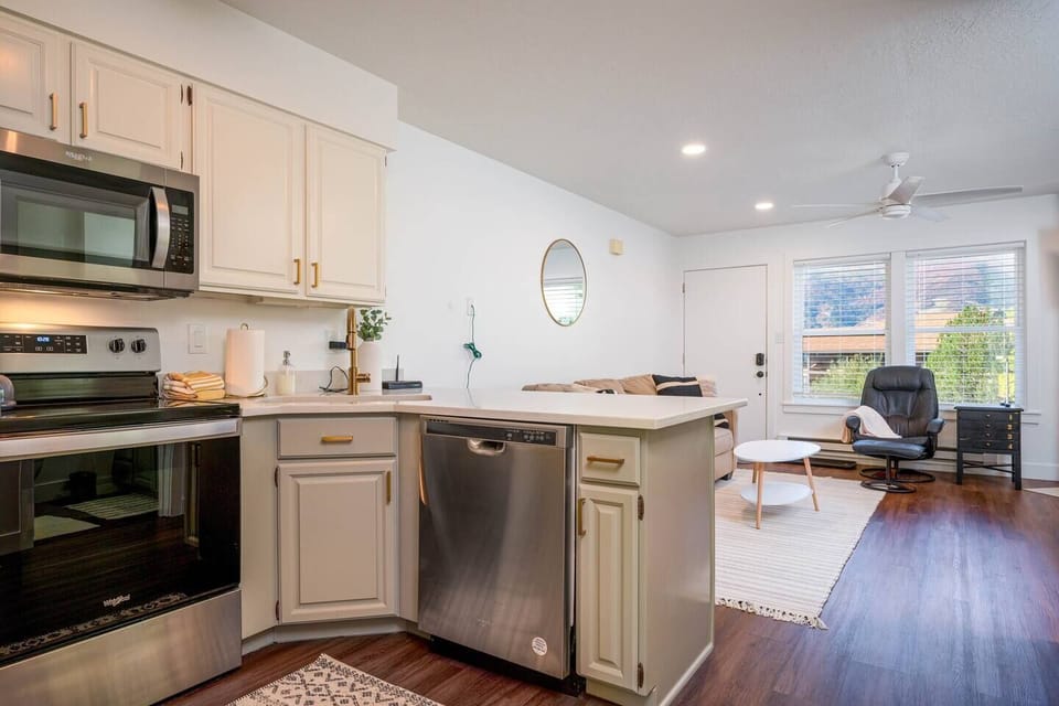 Experience seamless communication with friends and guests in the open-concept floor plan.