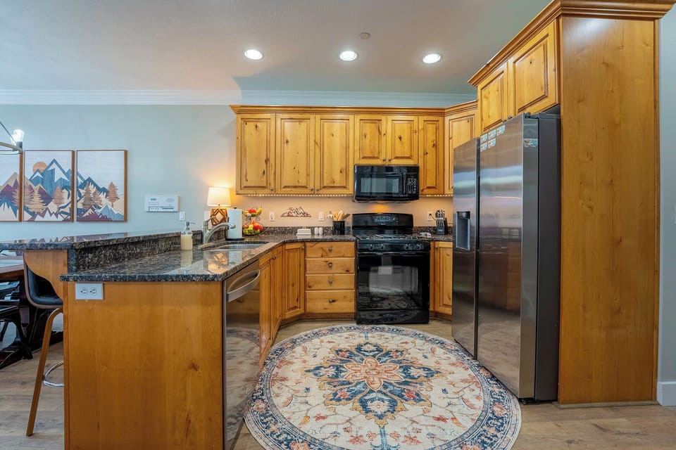 Cook your favorite meals in a kitchen bathed in natural light that enhance the culinary experience.