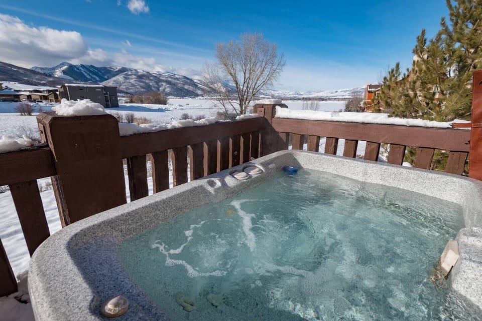Enjoy the mountain view from the private hot tub!