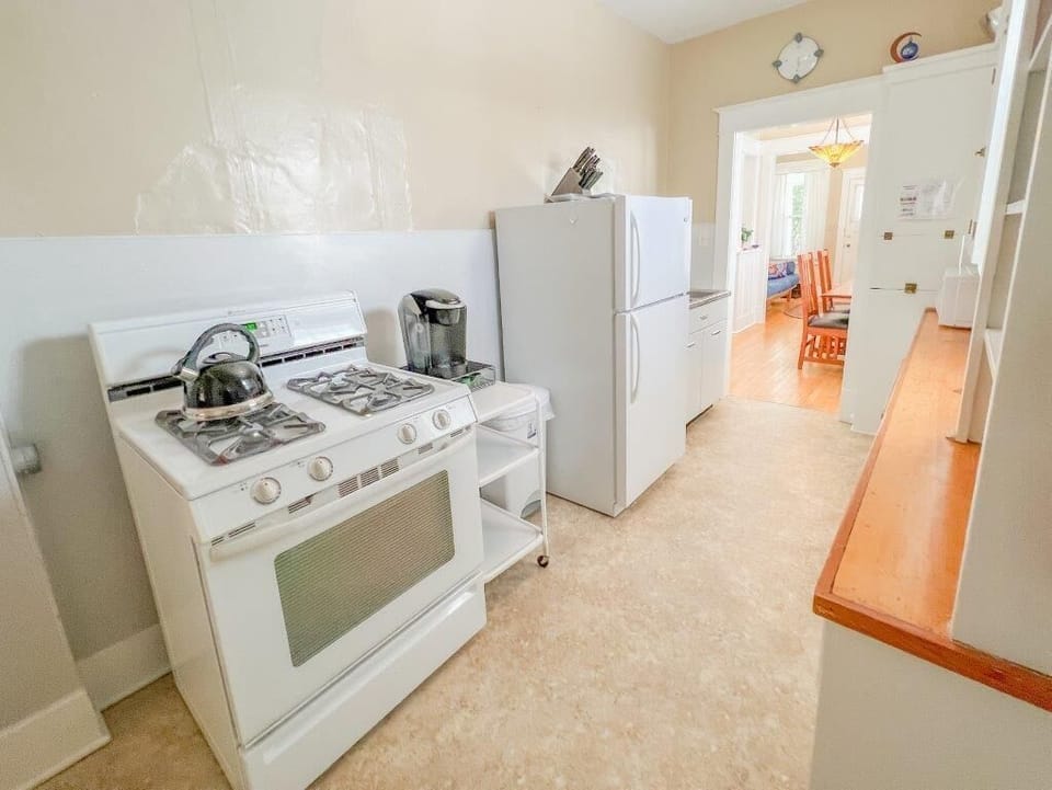 Equipped with gas cook top, full fridge and freezer, coffee pot and pod coffee maker,  and all the essentials