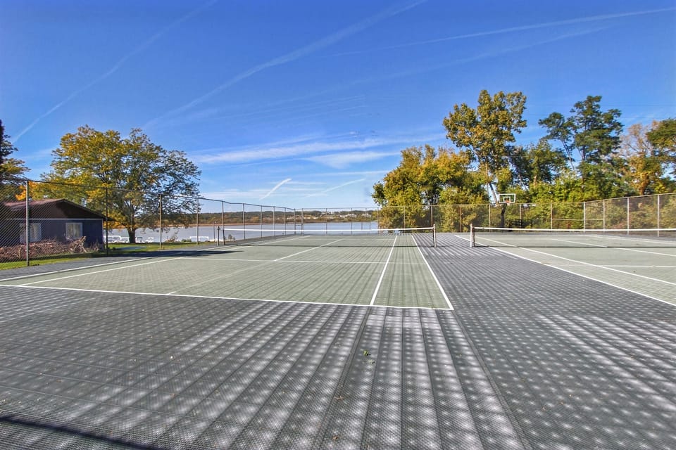 Tennis courts located right on the lake.