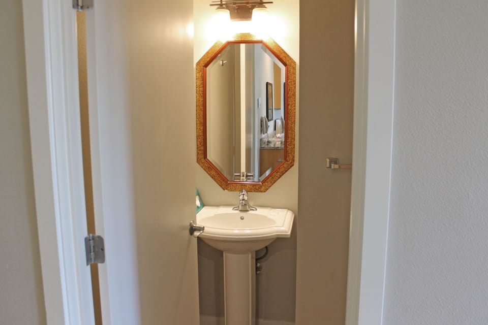 On the left, the half bath