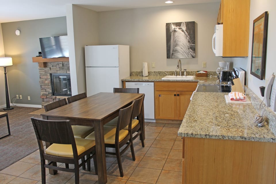 Down the hall, the open Kitchen, Dining, Living