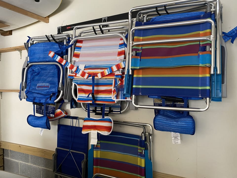 3 umbrellas, 1 canopy & 8 beach chairs to go with 8 included beach badges!