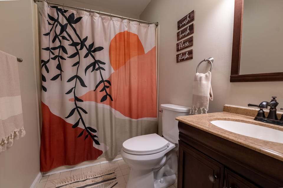 Main floor full bathroom with tub