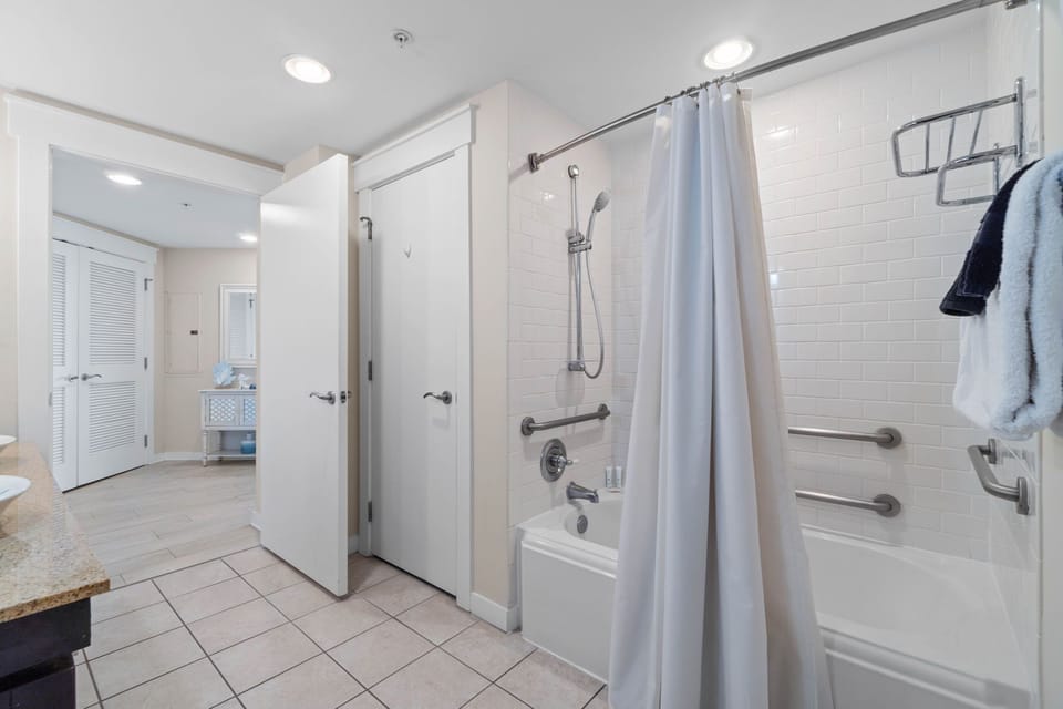 Full bathroom with shower and tub combo
