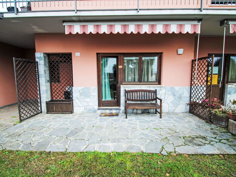 Floor, Flooring, Door, Shade, Balcony, Flagstone, Outdoor Furniture, Home Door, Houseplant, Courtyard