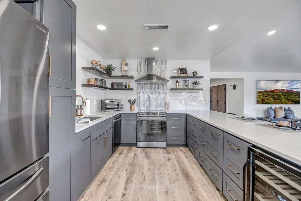 Fully Equipped Kitchen with Black Stainless Steel Appliances