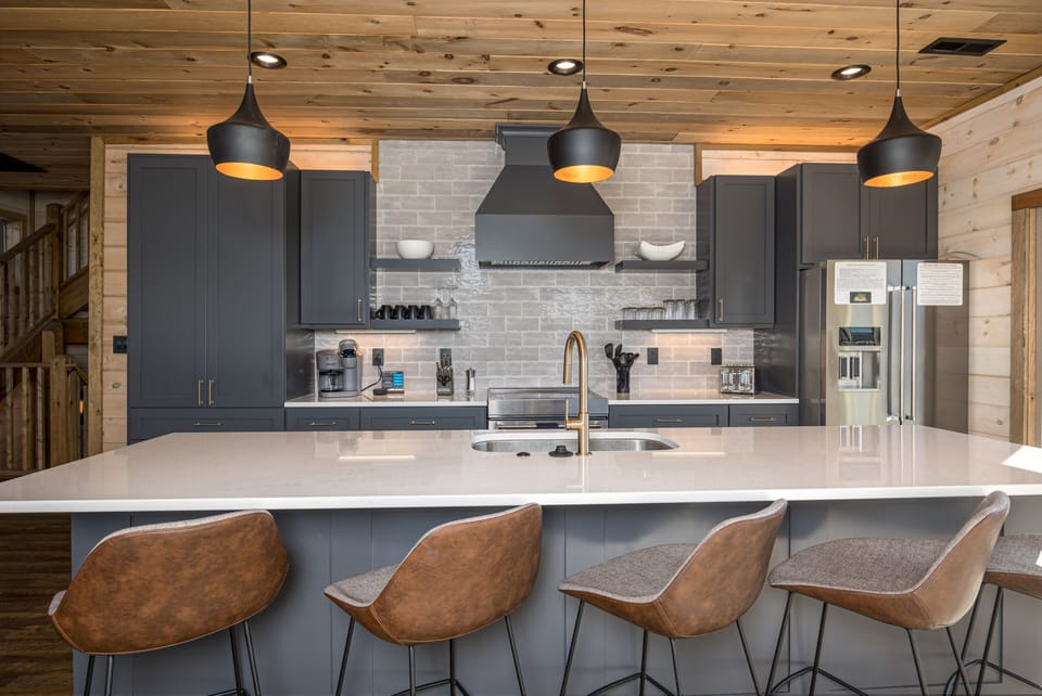 Kitchen island for additional seating,prepping, and serving.