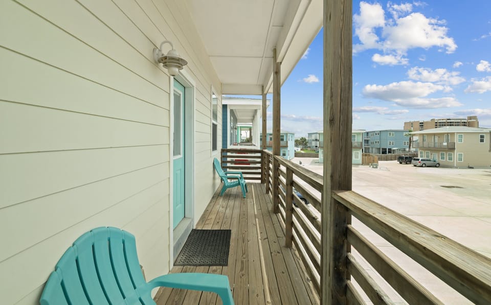 Upper Balcony — Turquoise Adirondack Chair & Neighborhood Views