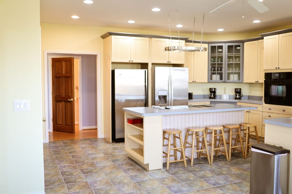 Fully stocked kitchen with seating at the island