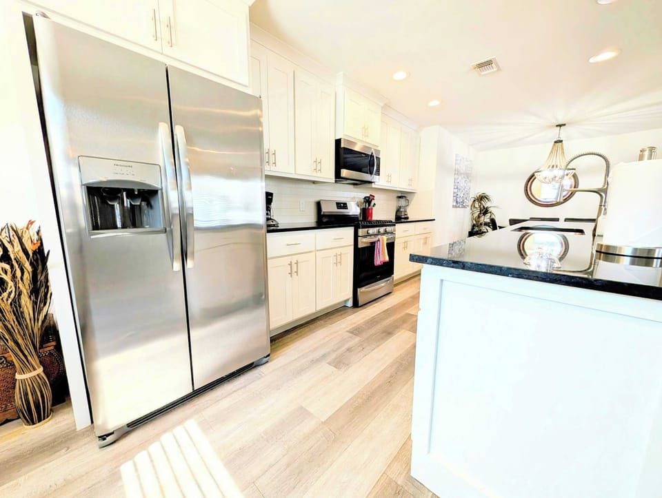 Cook, store, and clean in a brightly lit kitchen.