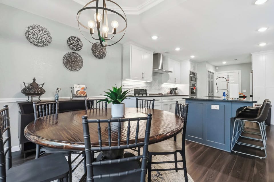 Brightly lit dining and kitchen