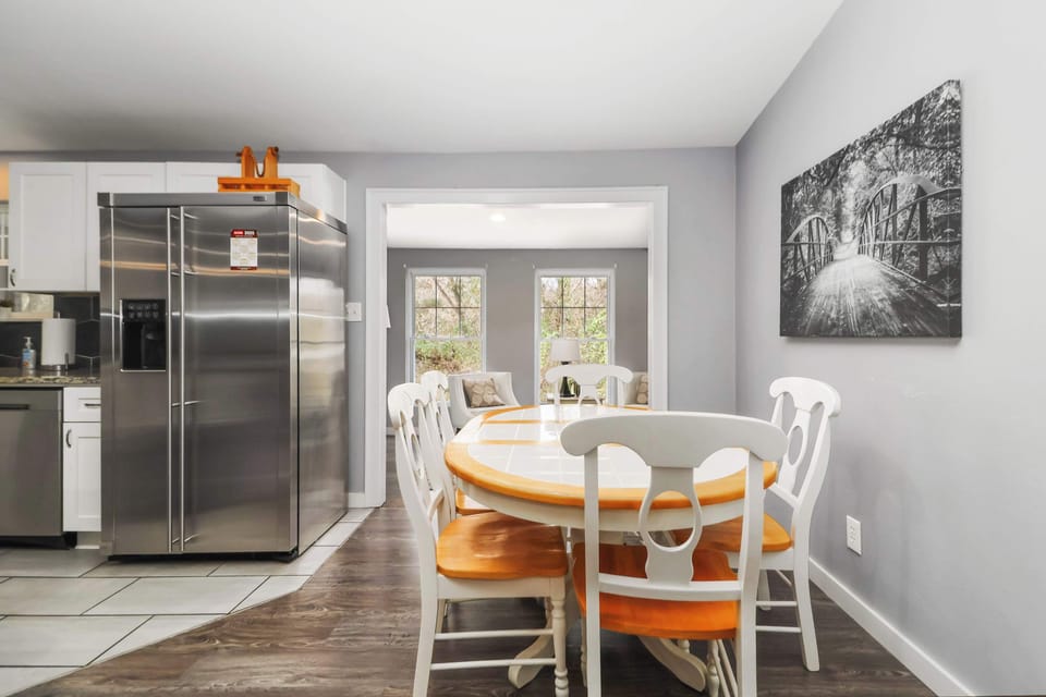 Modern kitchen, open plan dining area and stainless double door fridge