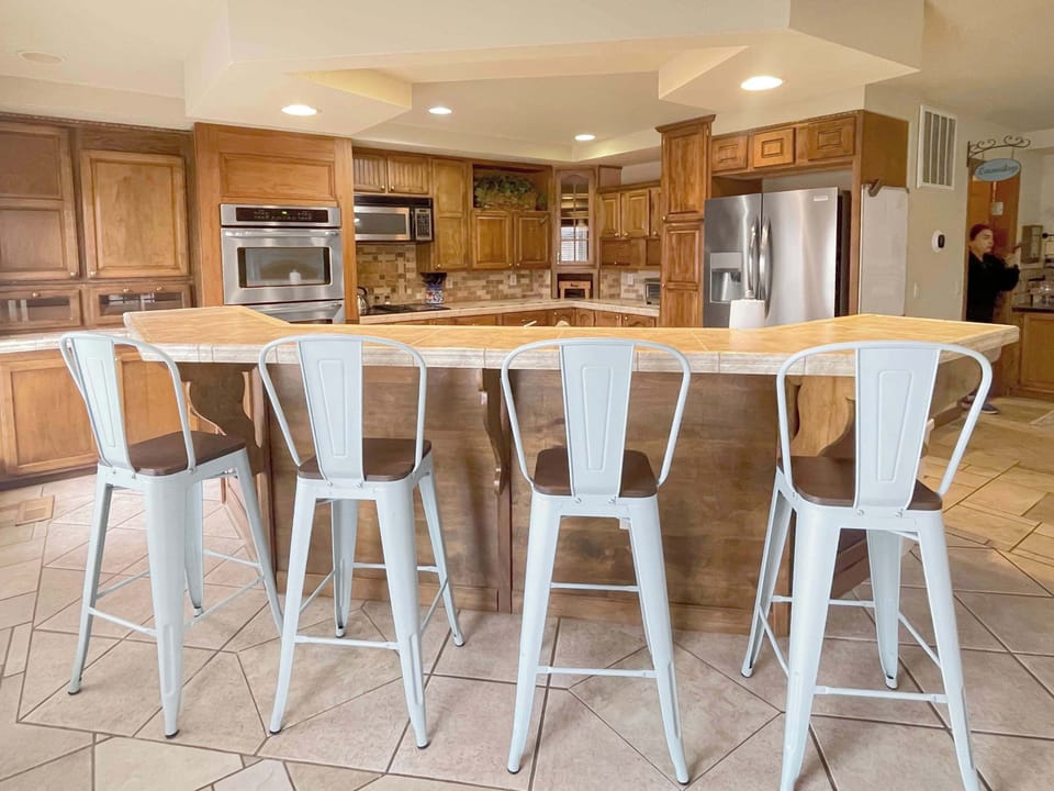 Engage in warm conversations and savory meals at the heart of home.