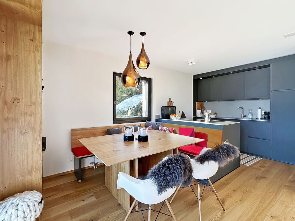Completely renovated kitchen opening onto a convivial dining room.