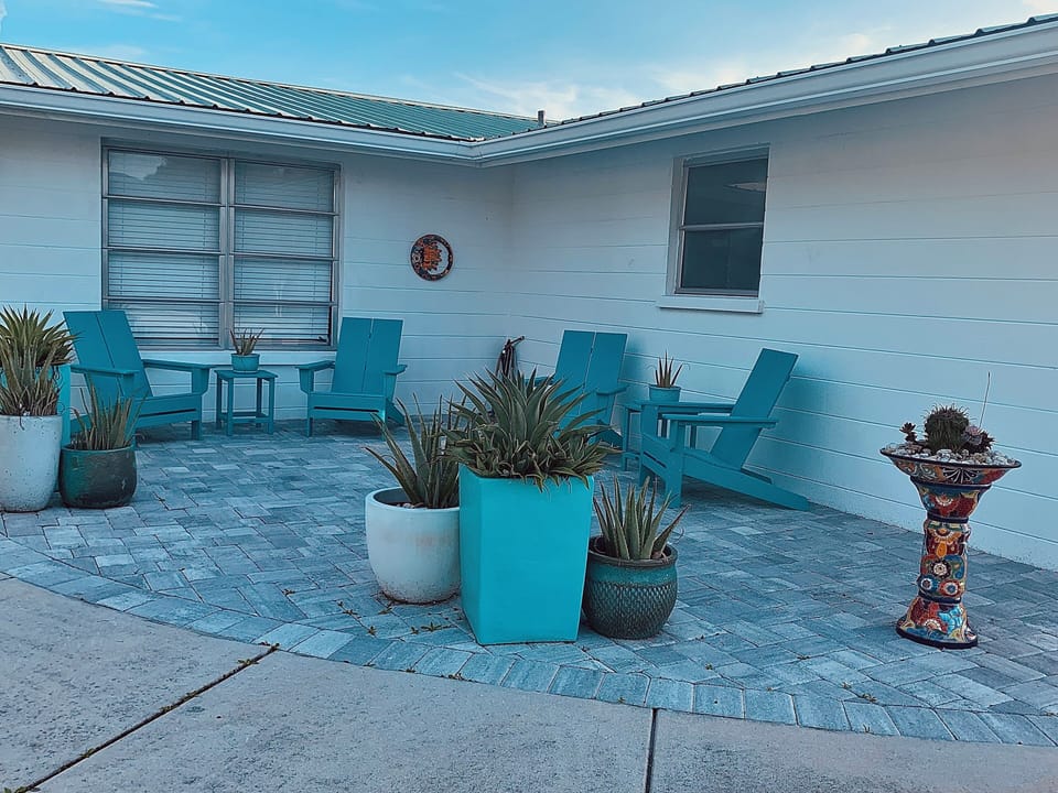 Front patio with Adirondack chairs to enjoy your morning coffee.