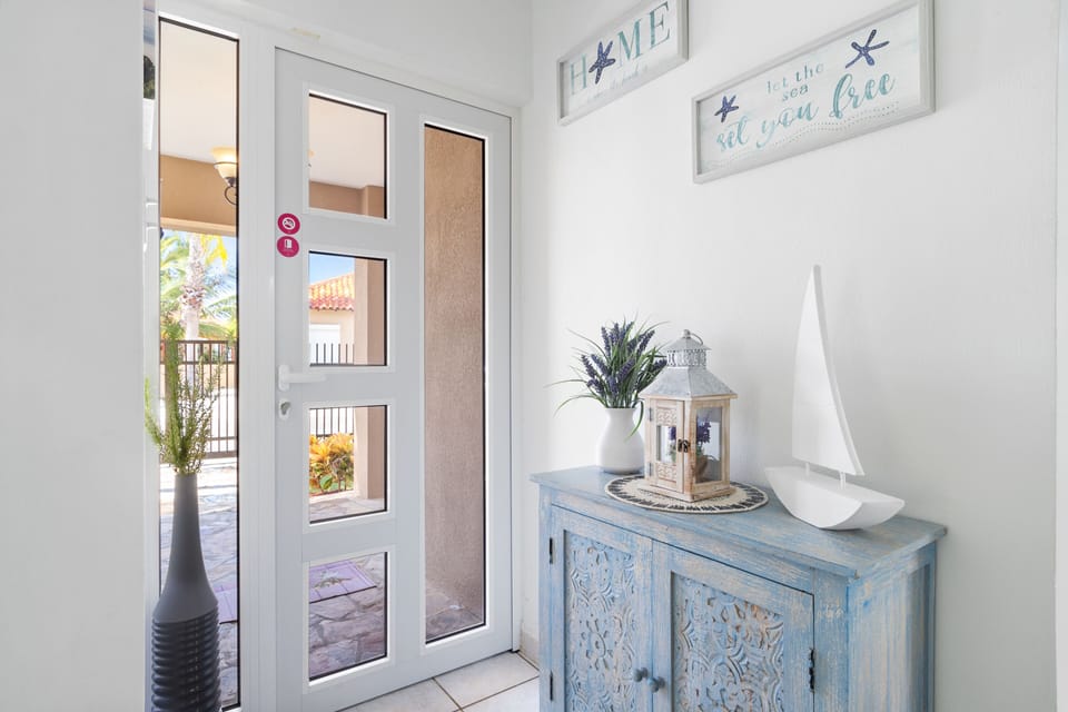 Inviting Entrance Area of the 2BR Home in Davenport - Spacious entrance gate. - Breathe fresh air with our thoughtfully placed green companions
