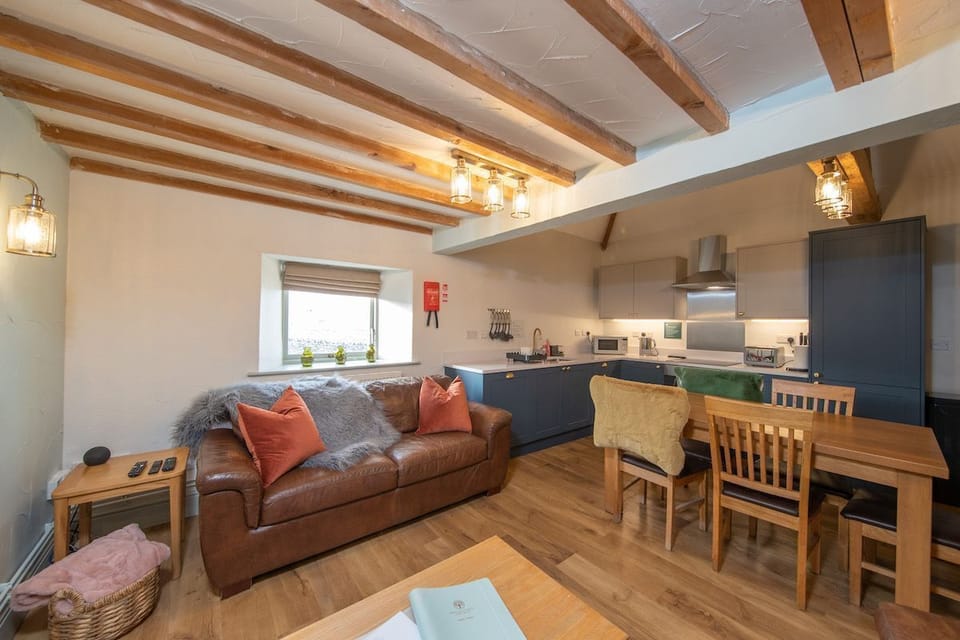 Nadin Cottage open plan living area with newly installed kitchen with integrated appliances