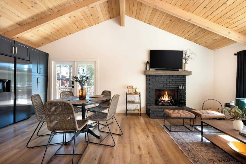 Gather for breakfast and view the fluffy white snow outside with a fire burning in the brick fireplace. 