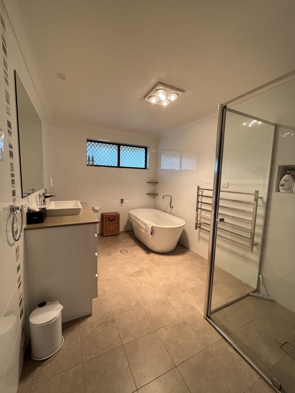 Main bathroom with freestanding bath and separate shower