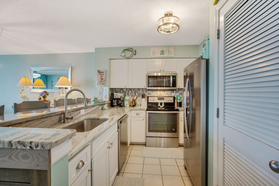 Fully Equipped Kitchen with New Stainless Steel Appliances