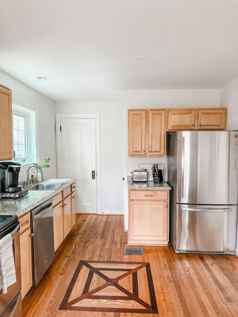 Fully stocked kitchen with stainless steel appliances