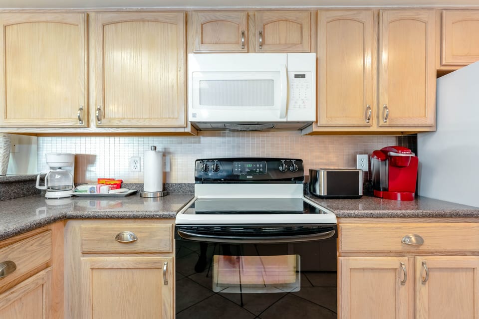 We've packed our lovely little kitchen with full-size appliances so you can get the most out of the space.