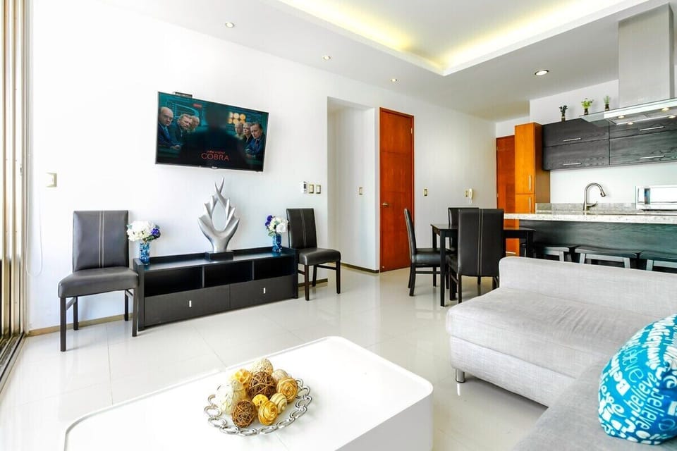 living room with couch and TV