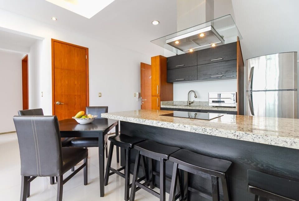 kitchen with dining table and breakfast counter