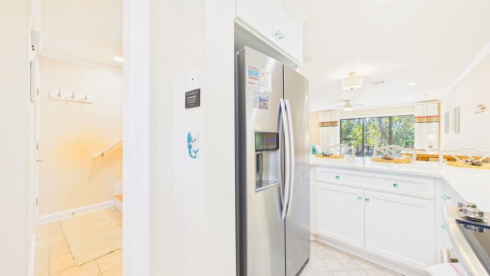 Full size refrigerator with ample storage, perfect for keeping things fresh during your stay.