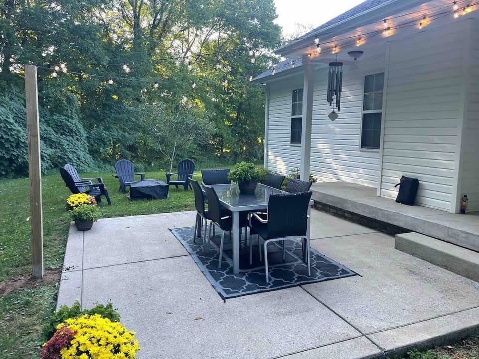 Gather around the table under string lights for memorable outdoor meals!