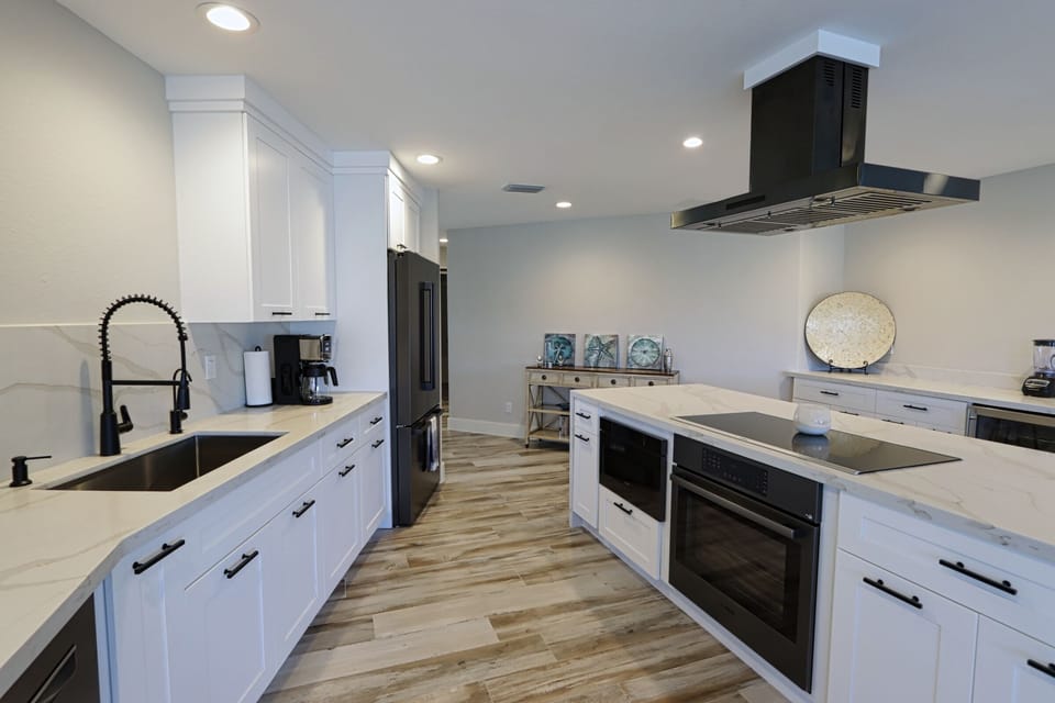 Kitchen with Black Stainless Steel appliances