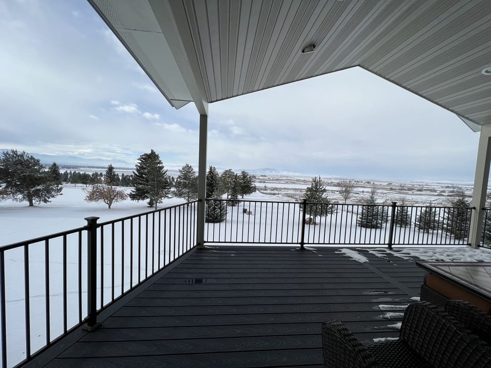 Spacious covered deck overlooking golf course
