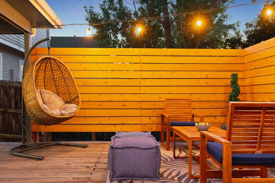 Gorgeous and private backyard deck with seating for everyone.