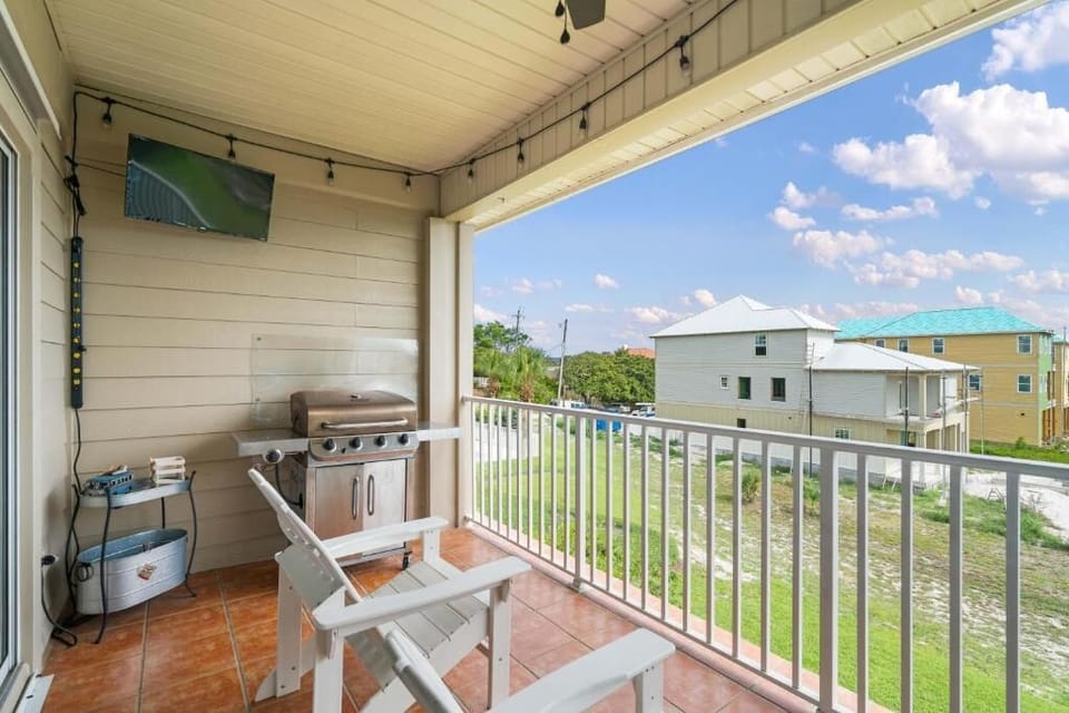 Second Floor Balcony With Grill and Partial View of Gulf