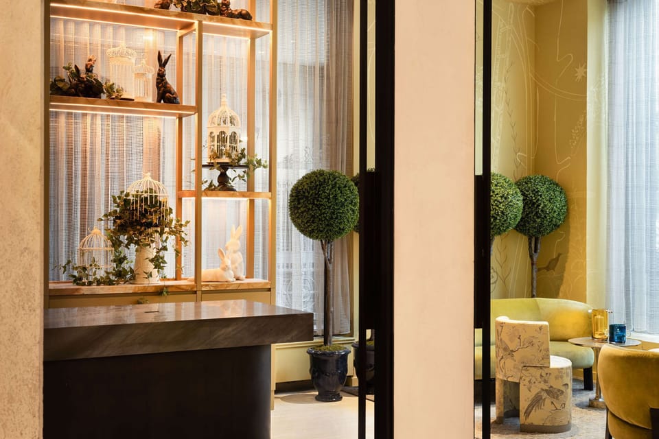 Pause and relax in a stylish lobby with curated decor.