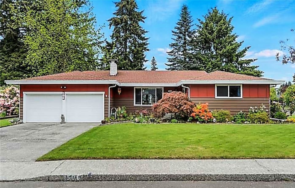 Spacious rambler w/ driveway for 2 vehicles and free on-street parking.