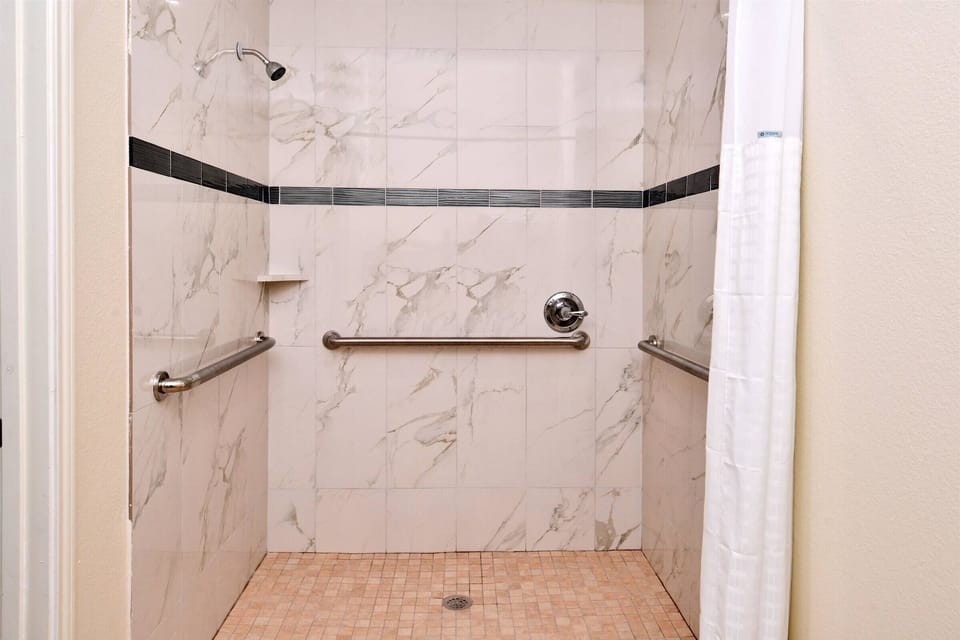 Rinse off easily in the spacious walk-in shower.