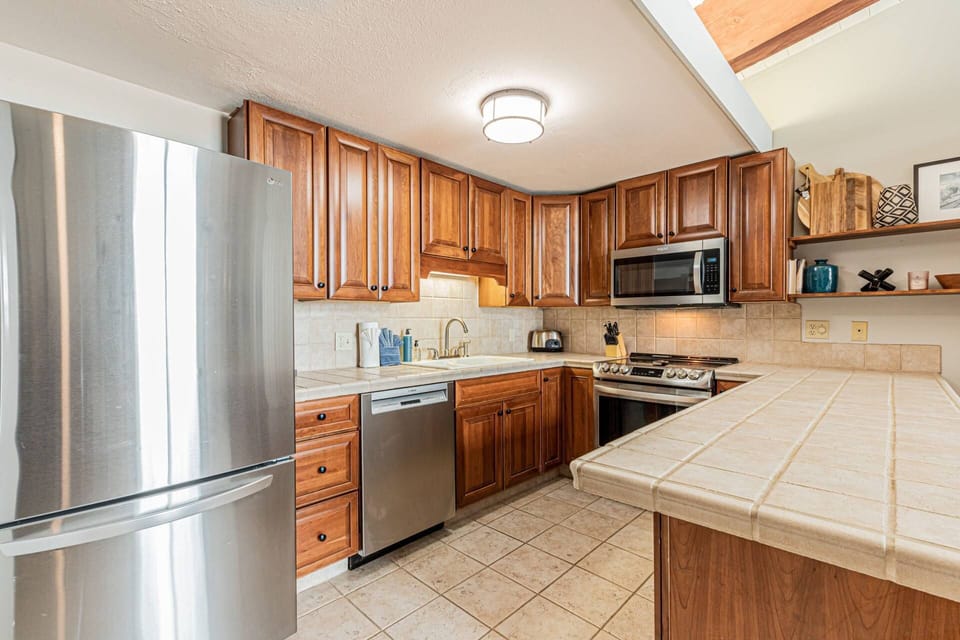 Updated appliances and plenty of cabinet storage to help keep your counter space free for meals and entertaining!