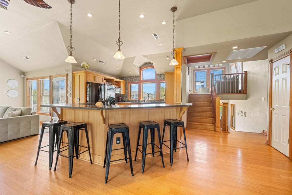 Kitchen with Bar Seating on Third Level