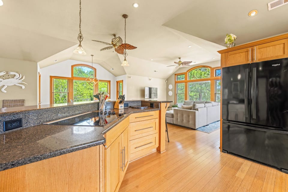 Kitchen with Bar Seating on Third Level