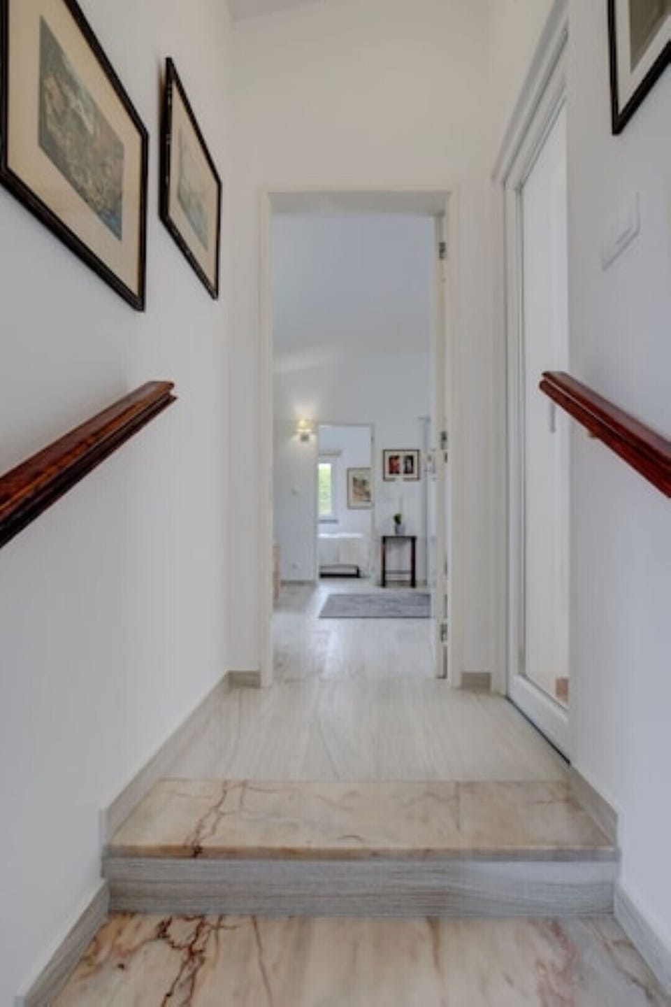 Three steps up to main room.