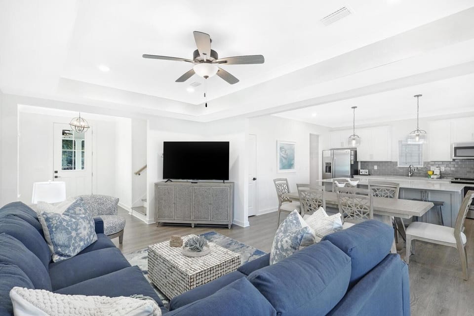 The main living areas of the home are seamlessly integrated, creating an open, airy space to gather and enjoy making new memories together.