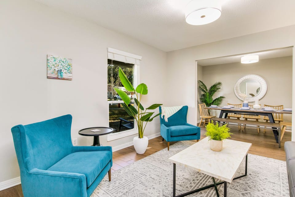 The front living room is connected to the dining room, creating an inviting atmosphere.