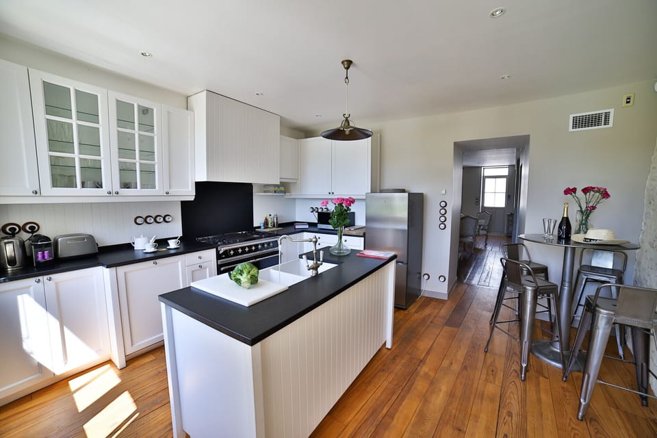 Open kitchen leading to living room