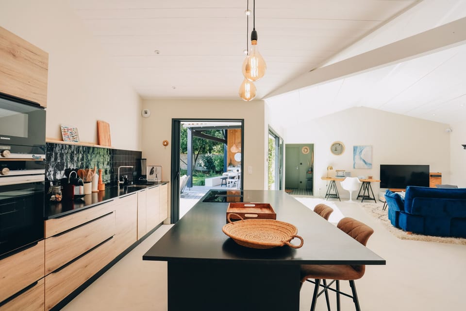 Bright kitchen with access to terrace and pool
