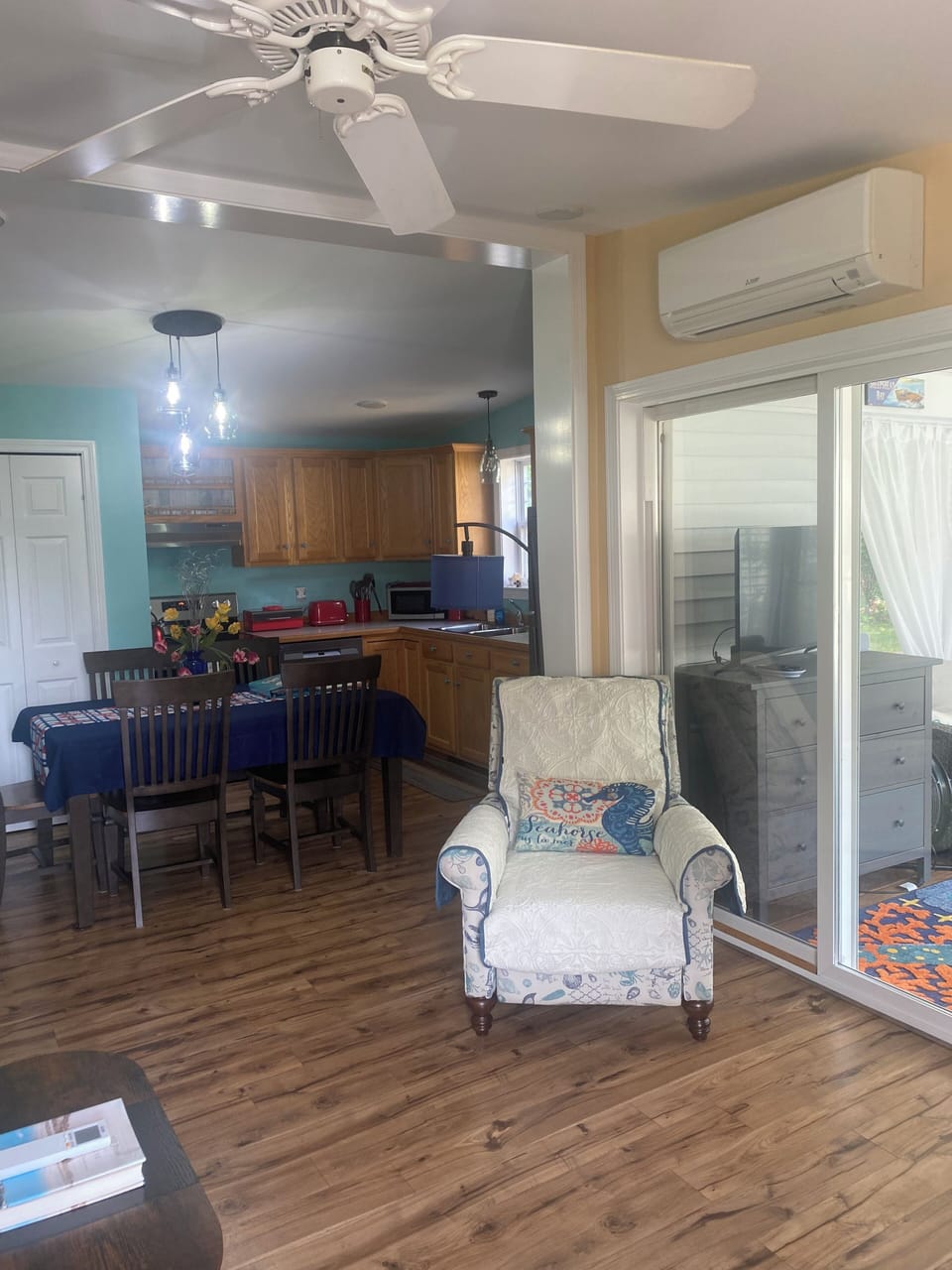 View of the sunroom and kitchen from the living room